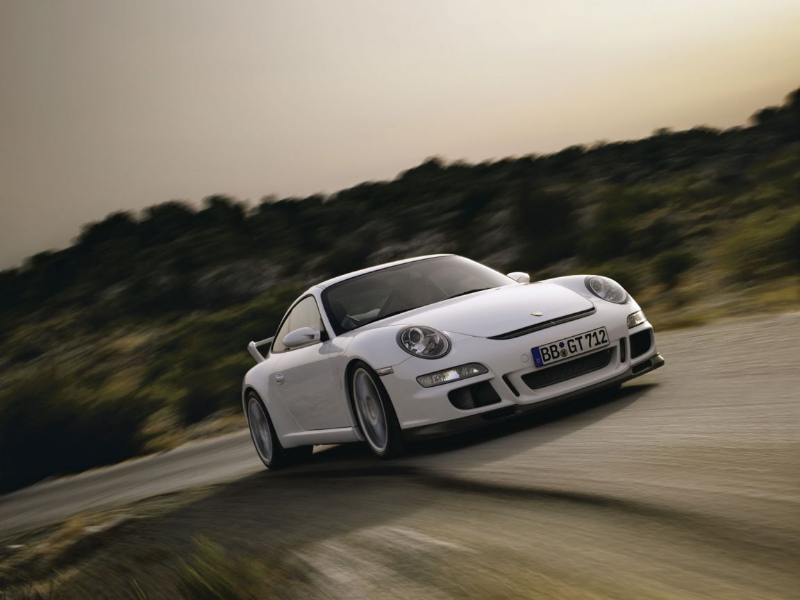 911 Gt3 Front Low Angle Driving Wallpaper 1152x864