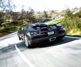 Ccx Black Rear View Driving Wallpaper