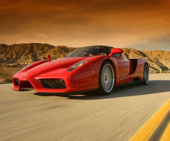 Enzo Driving Front Angle Wallpaper