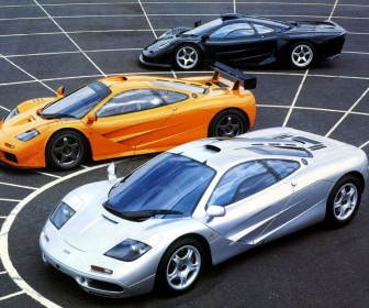 Mclaren F1 Silver Orange Black Variations Wallpaper