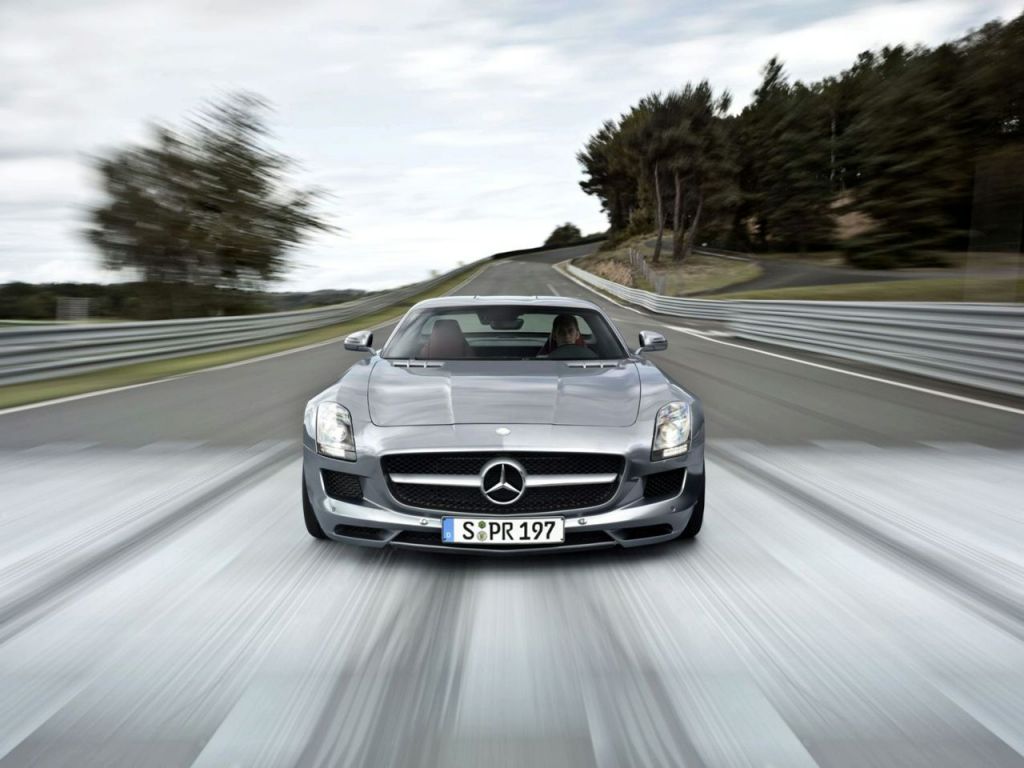 Sls Amg Front View On Road Wallpaper 1024x768