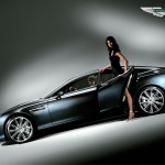 Vanquish Side View With Models Wallpaper