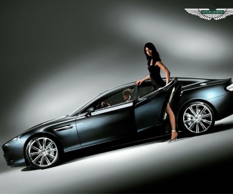 Vanquish Side View With Models Wallpaper