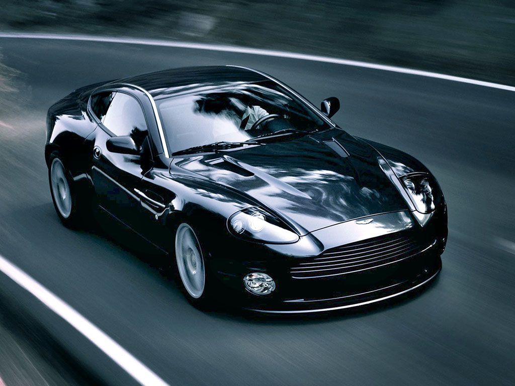 Vanquish V12 Black Driving High Angle Wallpaper 1024x768