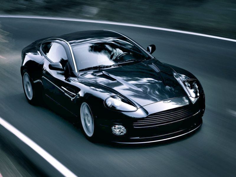 Vanquish V12 Black Driving High Angle Wallpaper 800x600