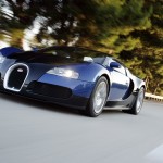 Veyron Blue Driving Front Low Angle Wallpaper