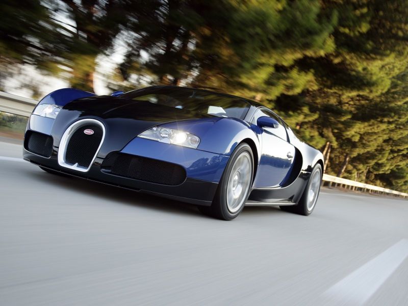 Veyron Blue Driving Front Low Angle Wallpaper 800x600