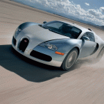 Veyron Silver Driving In Desert Wallpaper