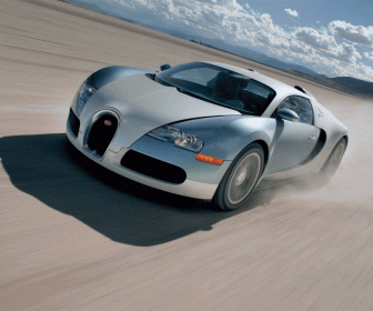 Veyron Silver Driving In Desert Wallpaper