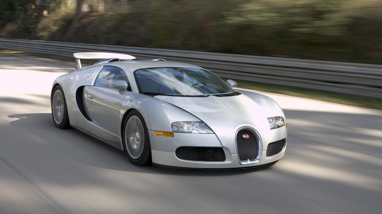 Veyron Silver Front Angle Driving Wallpaper 1280x720